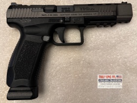 Canik TP9 SFx 9mm pistol in like-new condition with its distinctive optic-ready competition-style configuration.