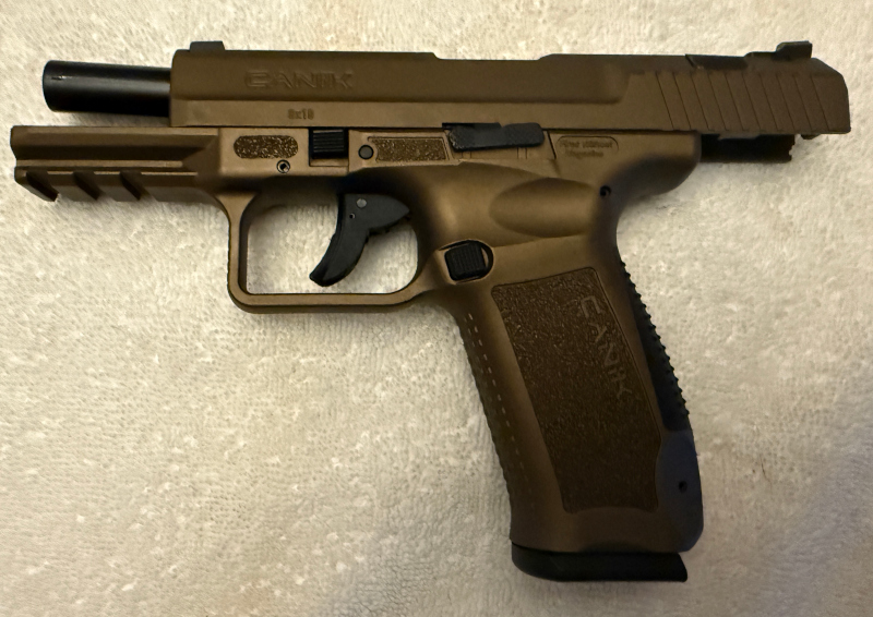 Canik TP9 DA 9mm Pistol – Like New – Two 18-Round Magazines & Original Case Canik TP9 DA 9mm pistol in like-new condition with two 18-round magazines and original factory case.