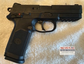 FNH USA FNX-45 .45 ACP pistol in excellent condition, includes four magazines and original factory box.