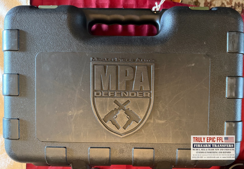 MasterPiece Arms Defender 9mm – Very Good Condition – Faux Suppressor, Extended Magazine & Original Case MasterPiece Arms Defender 9mm with faux suppressor, extended magazine, and original case.