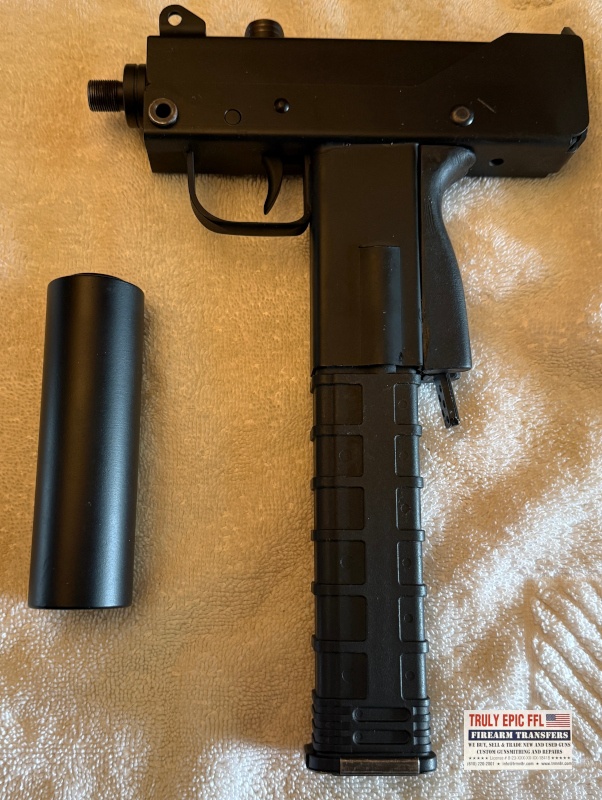 MasterPiece Arms Defender 9mm – Very Good Condition – Faux Suppressor, Extended Magazine & Original Case MasterPiece Arms Defender 9mm with faux suppressor, extended magazine, and original case.