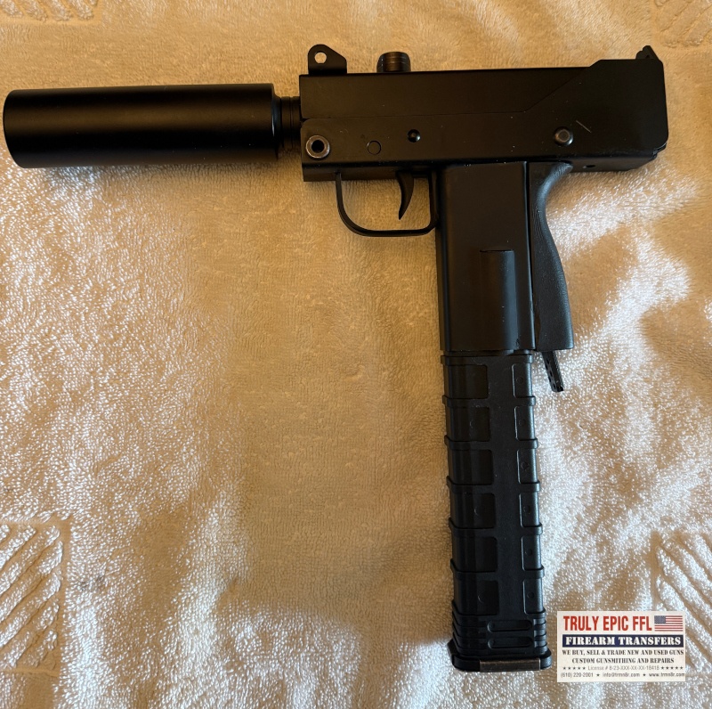 MasterPiece Arms Defender 9mm – Very Good Condition – Faux Suppressor, Extended Magazine & Original Case MasterPiece Arms Defender 9mm with faux suppressor, extended magazine, and original case.