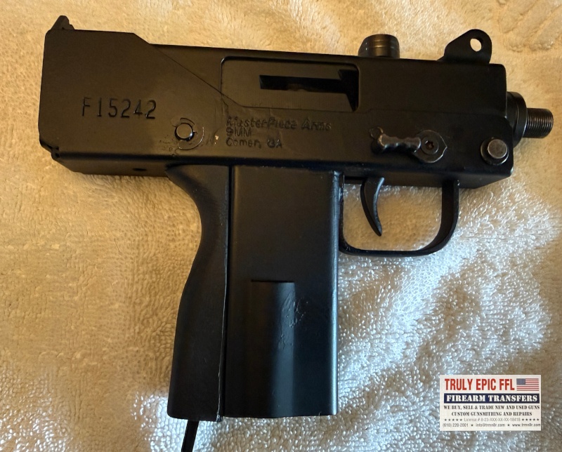 MasterPiece Arms Defender 9mm – Very Good Condition – Faux Suppressor, Extended Magazine & Original Case MasterPiece Arms Defender 9mm with faux suppressor, extended magazine, and original case.