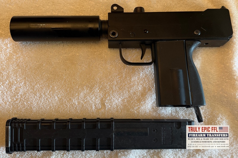 MasterPiece Arms Defender 9mm – Very Good Condition – Faux Suppressor, Extended Magazine & Original Case MasterPiece Arms Defender 9mm with faux suppressor, extended magazine, and original case.
