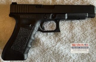 Glock G34 9mm pistol with factory case and two 17-round magazines